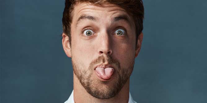 Man poking his tongue out