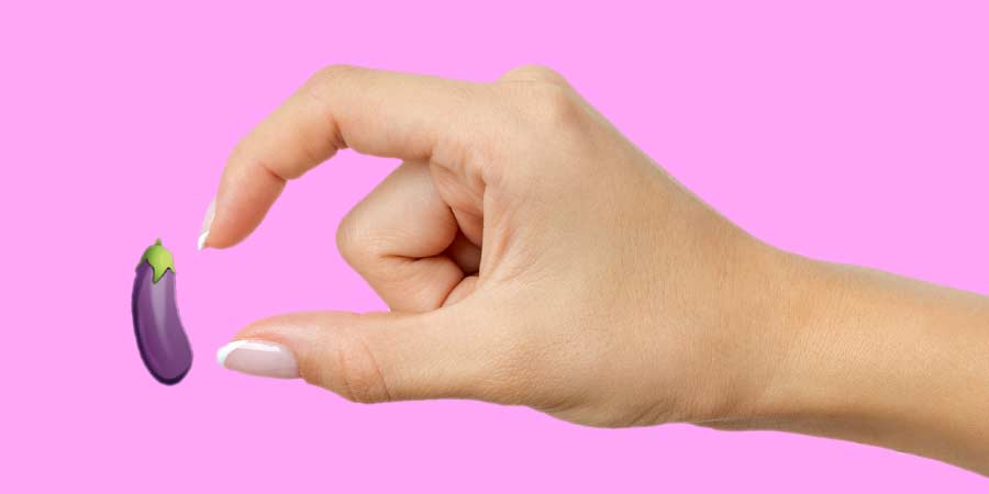 Image of a woman's hand pinching her fingers around an eggplant emojie